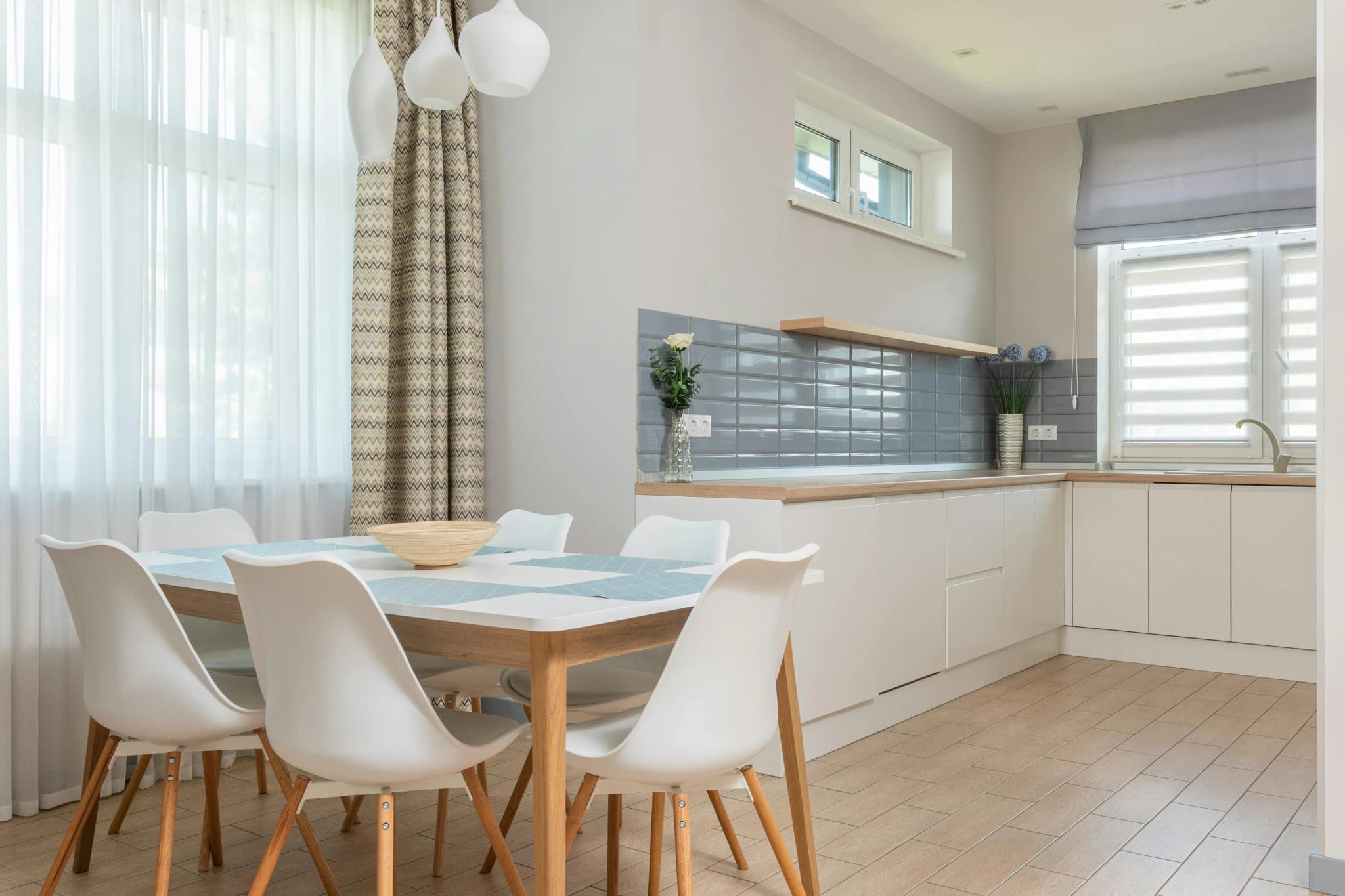 Elegant dining area with window treatments