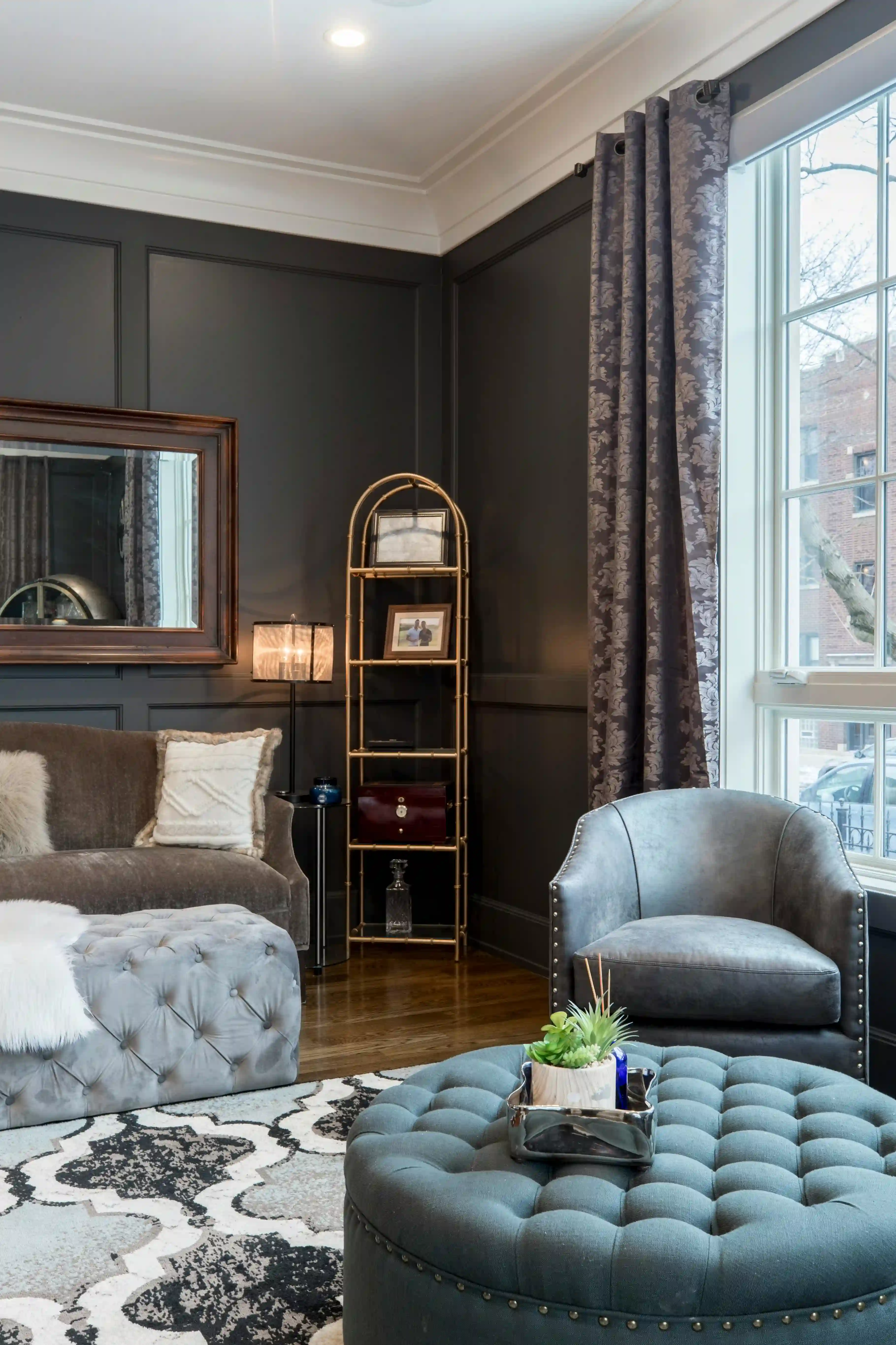 Interior designer consulting with client about window treatments
