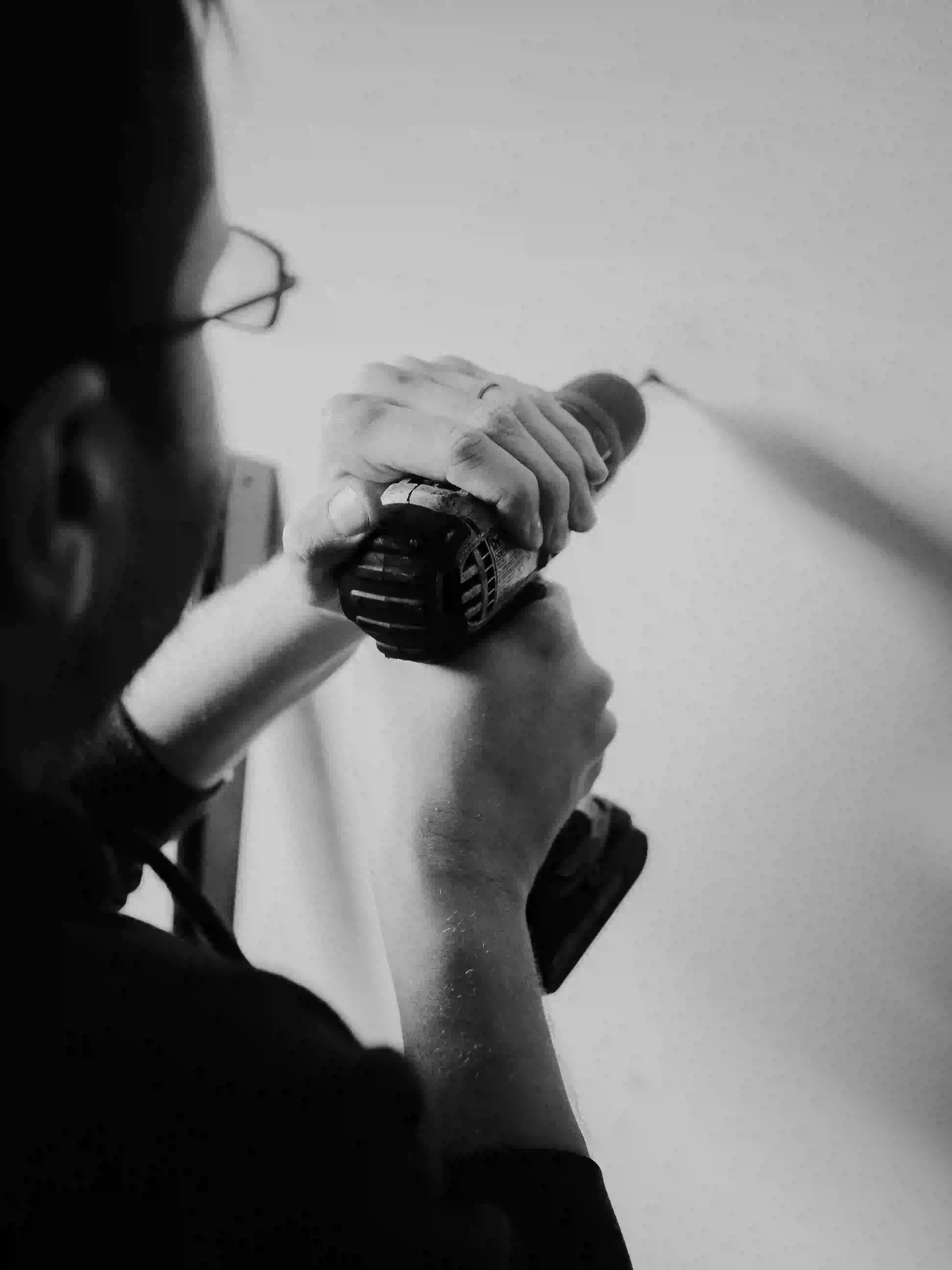 Professional installing custom curtains